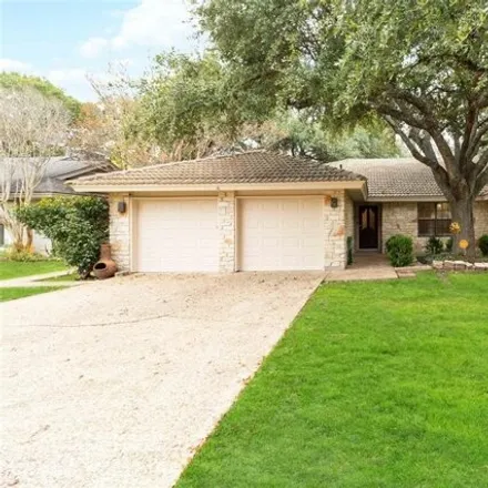 Buy this 4 bed house on 2409 Royal Lytham Drive in Austin, TX 78747