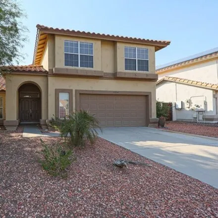 Rent this 3 bed house on 11024 South Desert Lake Drive in Goodyear, AZ 85338