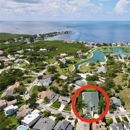 Buy this 4 bed house on 1968 North Pointe Alexis Drive in Tarpon Springs, FL 34689
