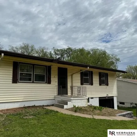 Buy this 3 bed house on 9426 Wirt Street in Omaha, NE 68134