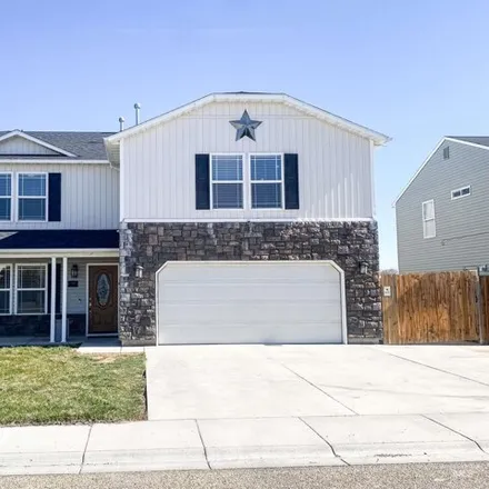 Buy this 4 bed house on 3407 Blossom Way in Caldwell, ID 83605