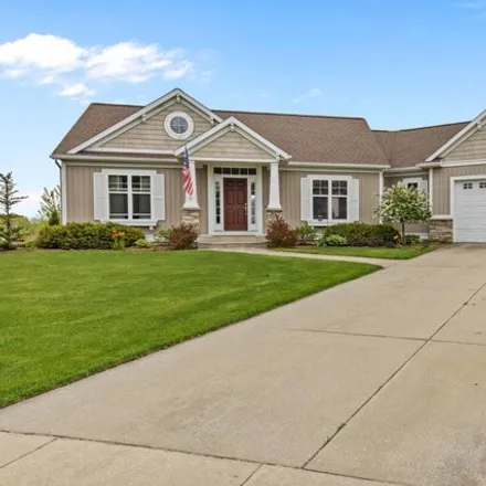Buy this 3 bed house on 898 Easthill Drive Northeast in Plainfield Charter Township, MI 49321
