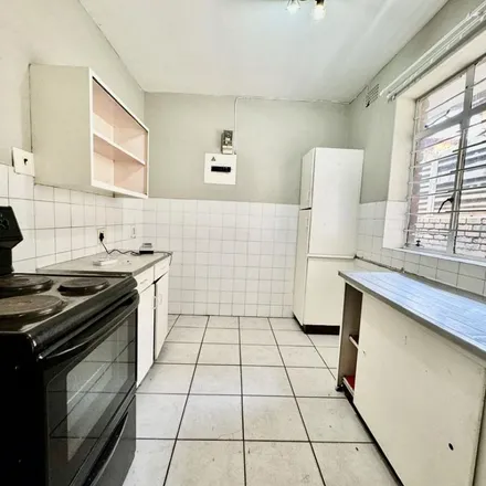 Rent this 2 bed townhouse on Lawn Street in Rosettenville, Johannesburg