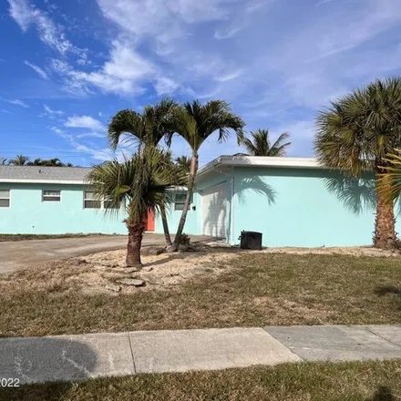 Rent this 4 bed house on 234 Orange Street in Satellite Beach, FL 32937