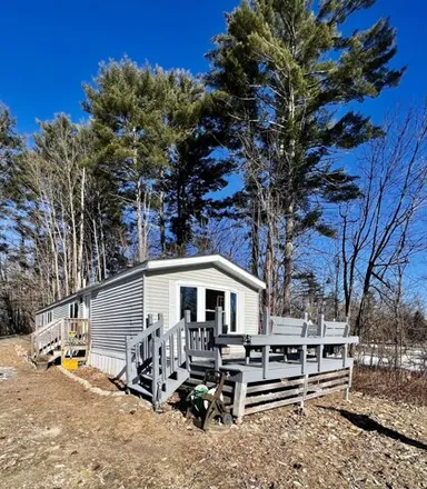 Buy this studio apartment on 239 Groveville Road in Buxton, ME 04093