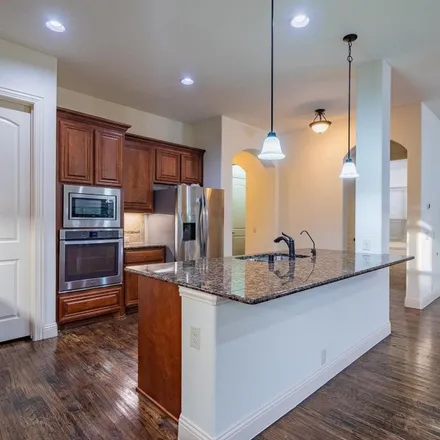 Rent this 4 bed apartment on 2346 Kemerton Drive in Plano, TX 75025