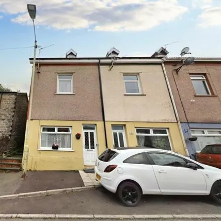 Buy this 4 bed townhouse on 47 Cardiff Road in Troed-y-rhiw, CF48 4LB