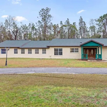 Buy this 5 bed house on 506 Plantation Road in Perry, FL 32348
