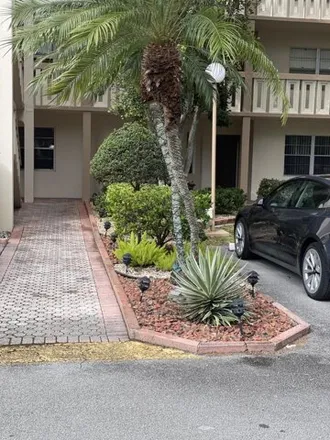 Rent this 2 bed condo on Wynmoor Circle in Coconut Creek, FL 33066