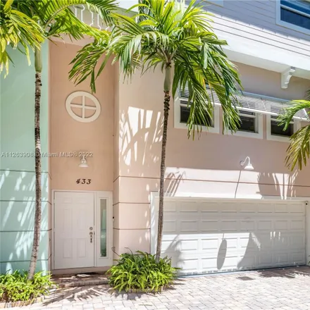 Rent this 4 bed townhouse on 433 Northeast 1st Street in Pompano Beach, FL 33060