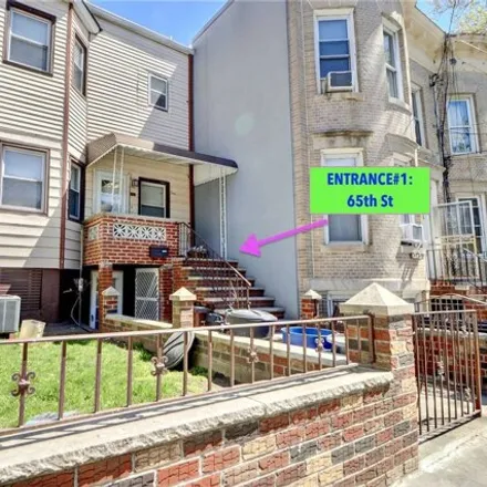 Buy this 4 bed house on 74-15 65th Street in New York, NY 11385