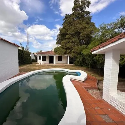 Rent this 4 bed house on Martín Gil in Padre Claret, Cordoba