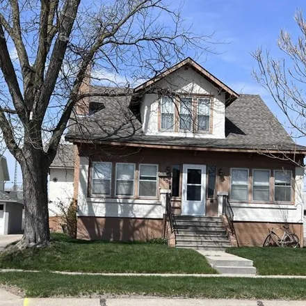 Buy this 4 bed house on 121 West 11th Street in Cozad, NE 69130
