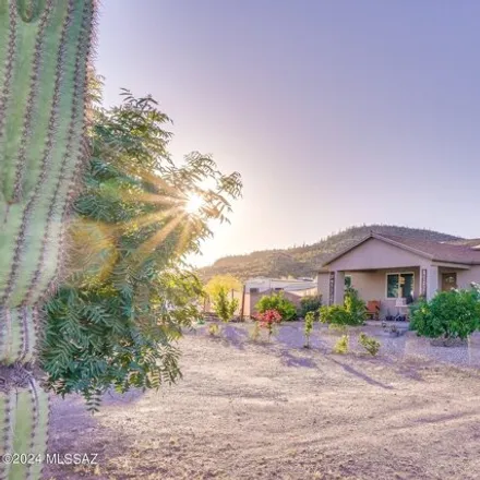 Buy this 4 bed house on 6480 South Caballo Road in Pima County, AZ 85746