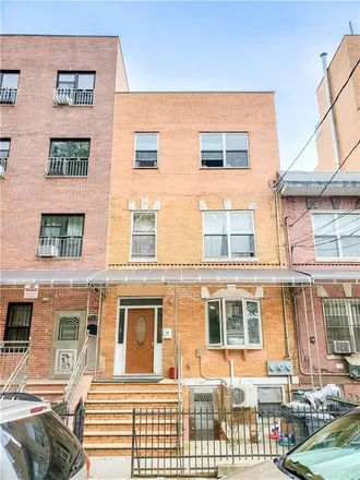 Buy this 9 bed townhouse on 918 58th Street in New York, NY 11219