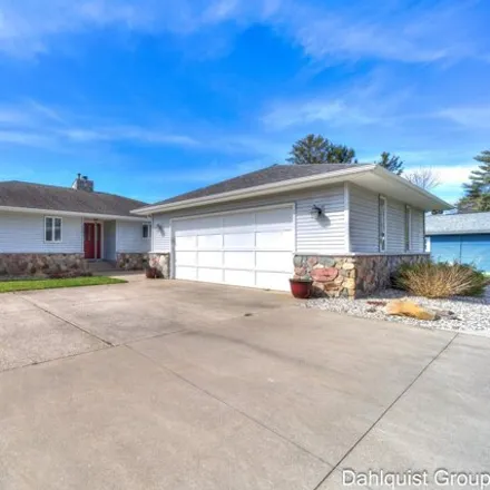 Buy this 3 bed house on 2667 Memorial Drive in Laketon Township, MI 49445