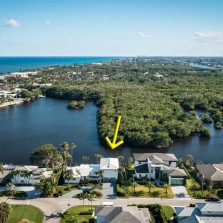 Rent this 4 bed house on 3 Inlet Cay Drive in Ocean Ridge, Palm Beach County
