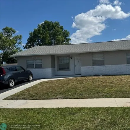 Buy this 5 bed house on 4699 Northwest 79th Avenue in Lauderhill, FL 33351