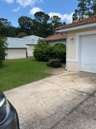 Rent this 3 bed house on 8 Eton Lane in Palm Coast, FL 32164