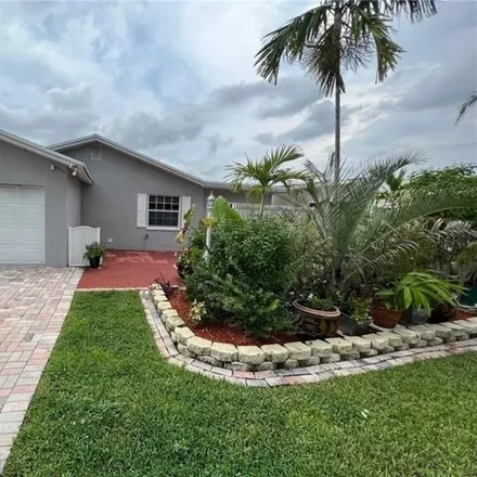 Rent this 3 bed house on 9635 Southwest 12th Court in Palm Beach County, FL 33428