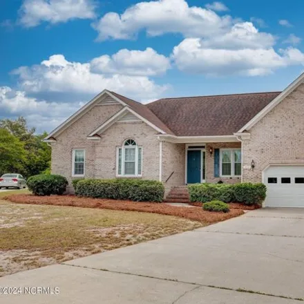 Buy this 4 bed house on Club Court in New Hanover County, NC 28412