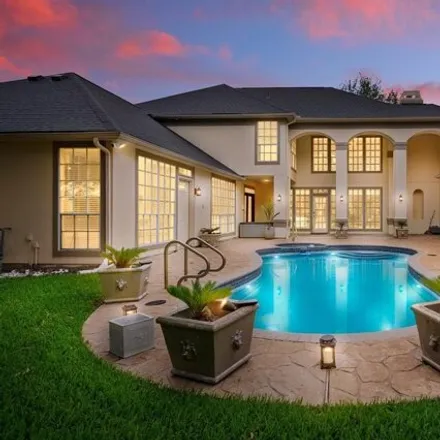 Buy this 4 bed house on 83 Rippling Creek Drive in Sugar Land, TX 77479