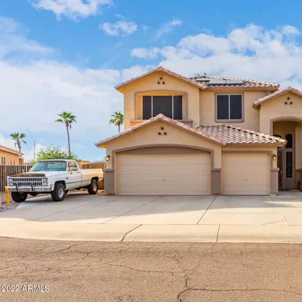 Buy this 4 bed house on 15708 West Hilton Avenue in Goodyear, AZ 85338