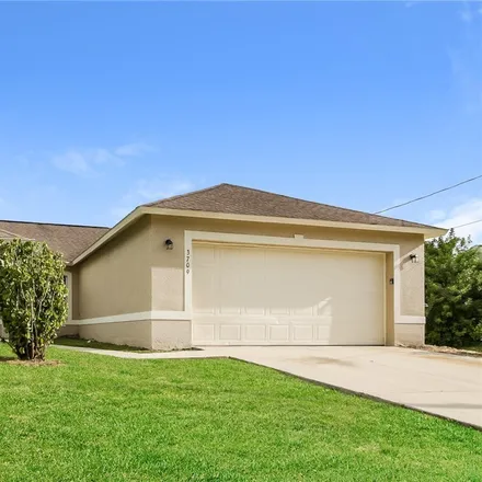 Rent this 3 bed house on 3709 15th Street West in Lehigh Acres, FL 33971