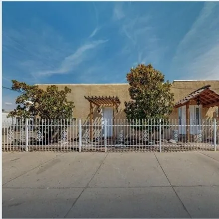 Buy this 6 bed house on 180 Indiana Street Southeast in Albuquerque, NM 87108