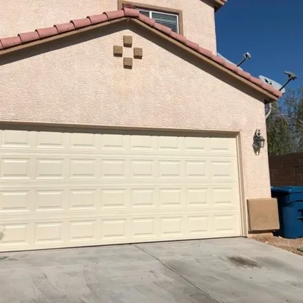 Rent this 4 bed house on 4900 West Crusoe Creek Court in Enterprise, NV 89141