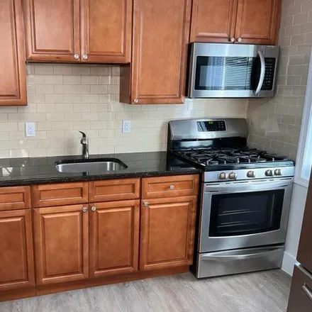 Rent this 3 bed apartment on 1447 South 8th Street in Philadelphia, PA 19147