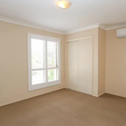 Rent this 5 bed apartment on 74 Crestwood Drive in Molendinar QLD 4214, Australia