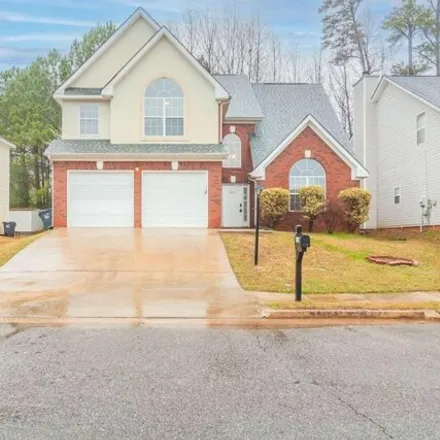 Buy this 4 bed house on 2963 Jenkins Drive in Snellville, GA 30078