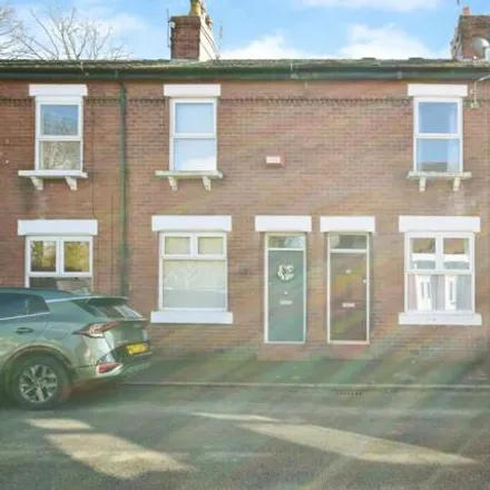 Rent this 2 bed townhouse on Beaconsfield Road in West Timperley, WA14 5LQ