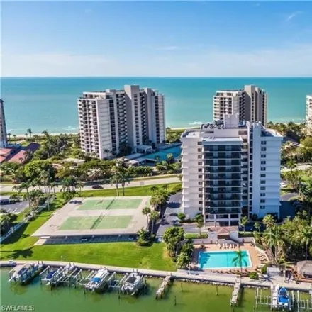 Rent this 3 bed condo on Gulfshore Drive in Pelican Bay, FL 34108