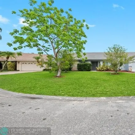 Buy this 4 bed house on 11459 Northwest 20th Drive in Coral Springs, FL 33071