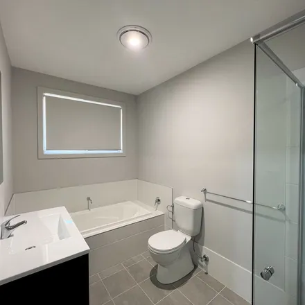 Rent this 4 bed apartment on Doomben Street in Menangle Park NSW 2563, Australia