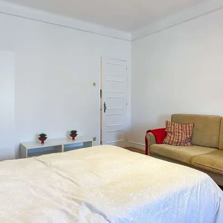 Rent this 4 bed apartment on Avenida Mouzinho de Albuquerque in 1170-284 Lisbon, Portugal