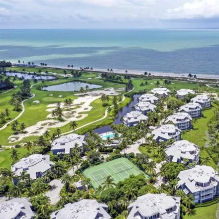 Buy this 3 bed condo on South Seas Golf Club in Marina Villas, Lee County
