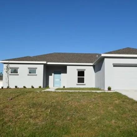 Rent this 4 bed house on 3234 Wideman Avenue in Palm Bay, FL 32909