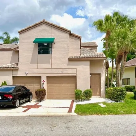 Buy this 3 bed house on 1676 Cypress Pointe Drive in Coral Springs, FL 33071