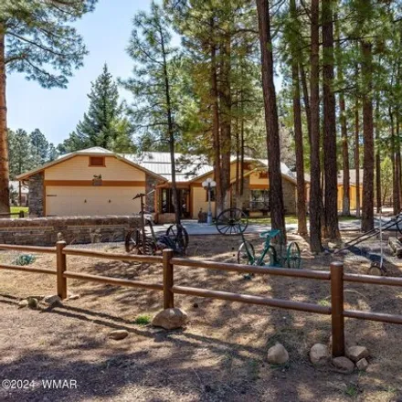 Buy this 3 bed house on 3863 West Old Linden Road in Show Low, AZ 85901