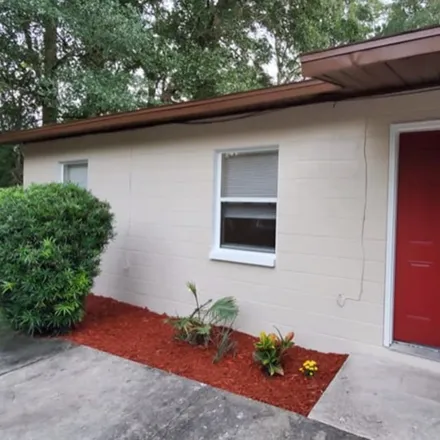 Rent this 2 bed house on 2049 NW 36th Ave