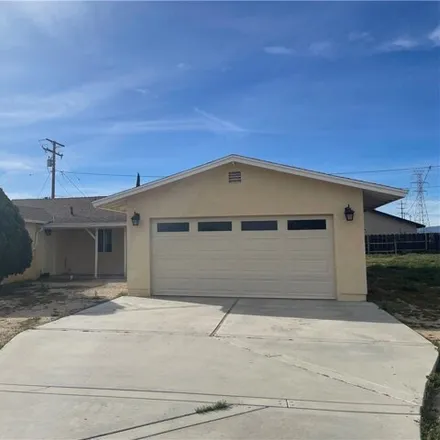 Rent this 4 bed house on 13821 Smoketree Street in North Star Ranch, Hesperia