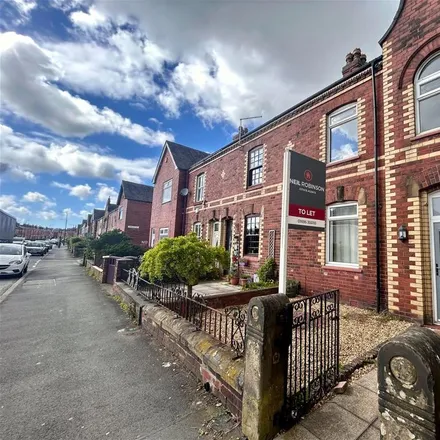 Rent this 3 bed townhouse on Langley Street in Wigan, WN5 9LD