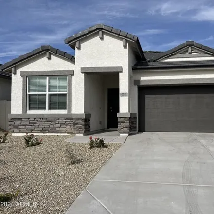 Rent this 4 bed house on 24068 West Whyman Avenue in Buckeye, AZ 85326