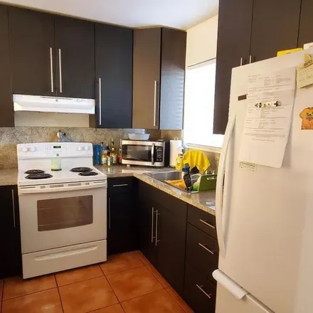Rent this 3 bed apartment on 6235 Southwest 66th Street in Miami-Dade County, FL 33183