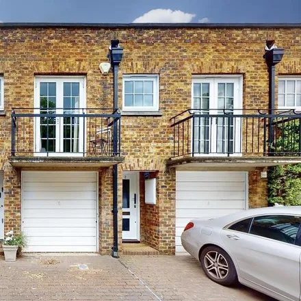 Rent this 2 bed townhouse on Holbrooke Place in London, TW10 6UD