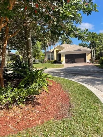 Buy this 4 bed house on 10967 Northwest 61st Court in Parkland, FL 33076