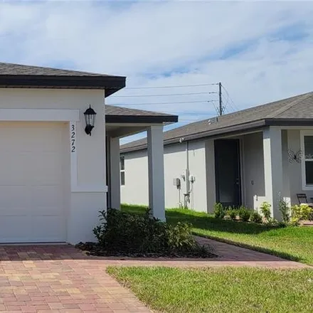 Rent this 4 bed house on 699 Bailey Circle in Polk County, FL 33897